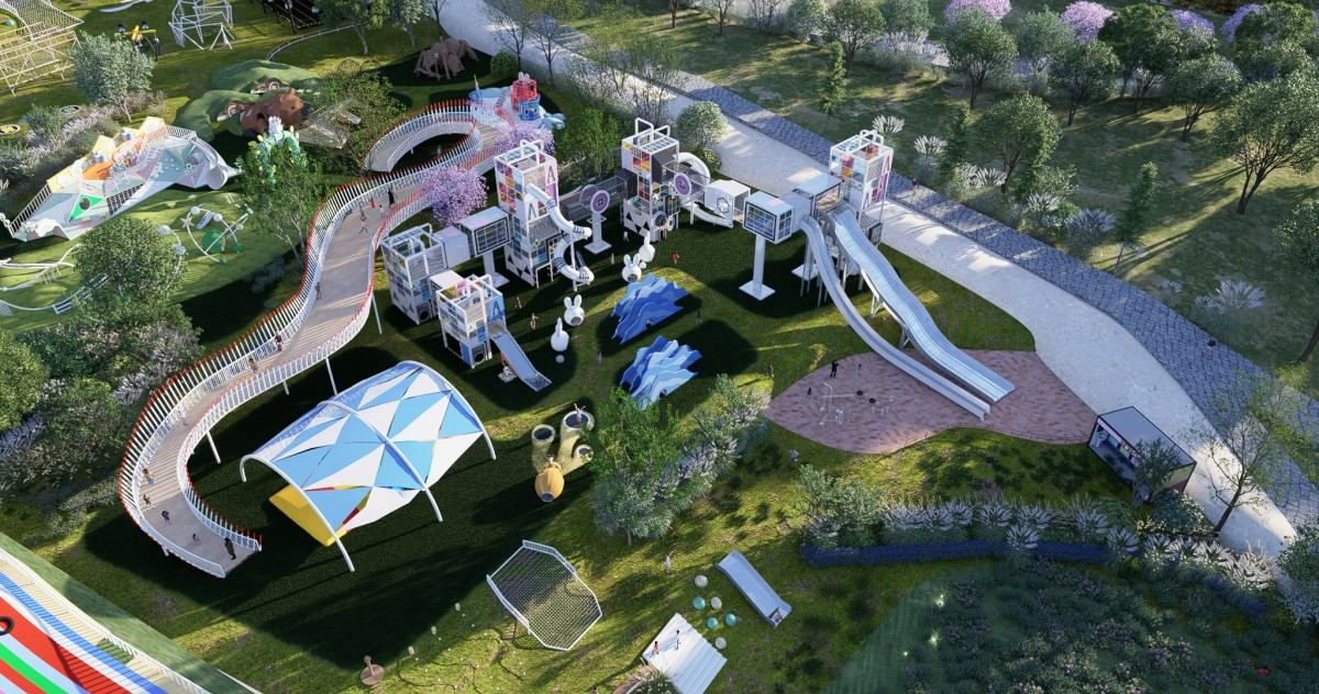 Proyecto de parque infantil tem&aacute;tico: vista a&eacute;rea de la torre de escalada, el dosel de membrana azul y la zona del arenero (representaci&oacute;n del dise&ntilde;o)